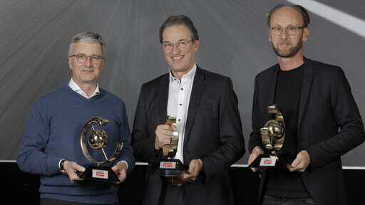 Volker-Koerdt-Editor-in-Chief-of-AUTO-ZEITUNG-(center),-Rupert-Stadler-(left)-Marc-Lichte-(right)-512x288.jpg